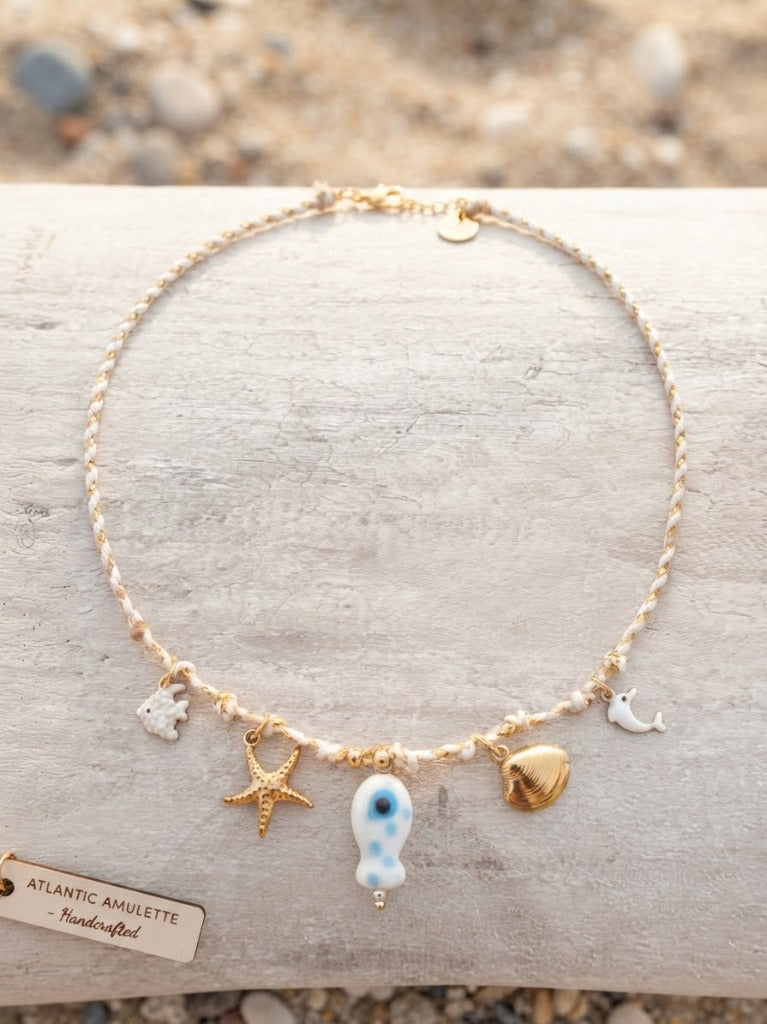 Collier Cordon Tressé Blanc & Doré avec Poisson en Verre Œil Bleu Protecteur, Dauphin Blanc & Coquillage - Acier Inoxydable 316L