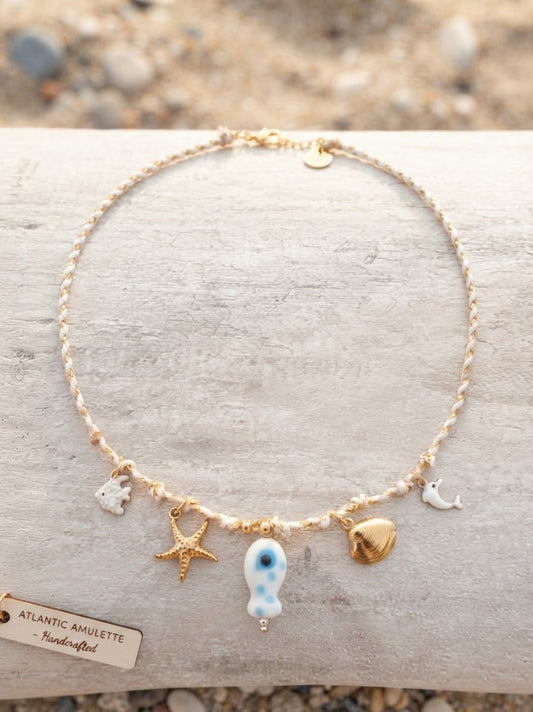 Collier Cordon Tressé Blanc & Doré avec Poisson en Verre Œil Bleu Protecteur, Dauphin Blanc & Coquillage - Acier Inoxydable 316L
